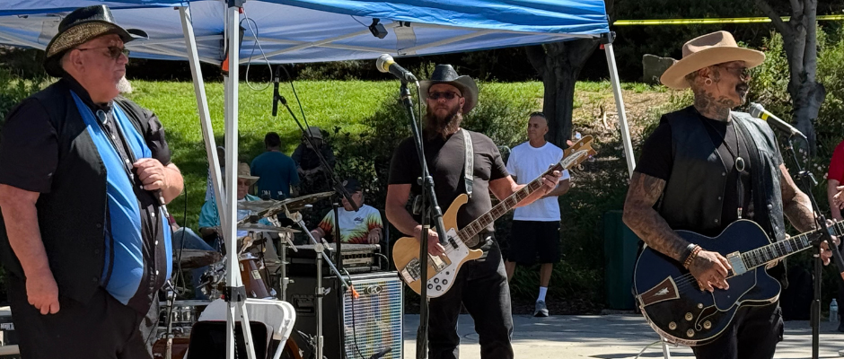 Dan McDowell and the Tradition started the festival with signature harmonica blues.