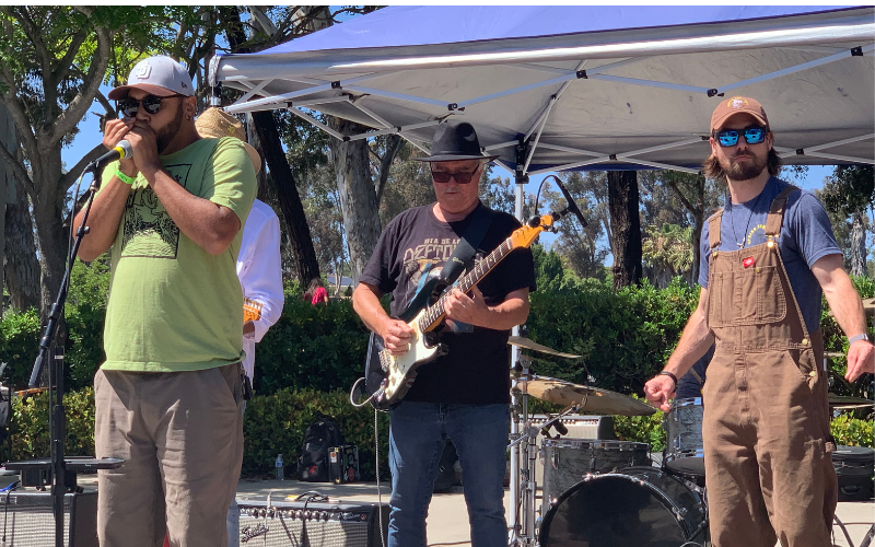 Harmonica players compete in the Unknown Players Jam