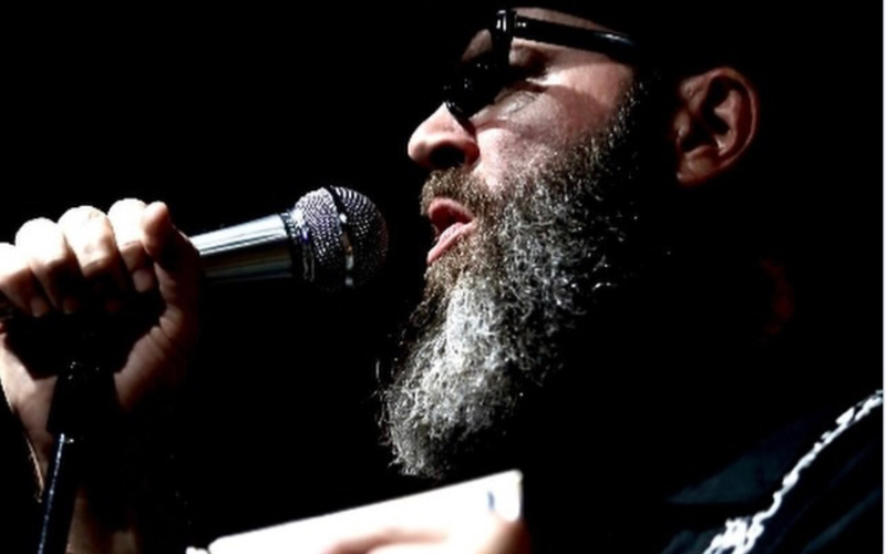 Troy Sandow with his harmonica
