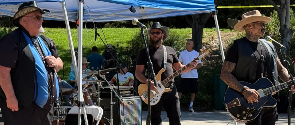 Dan McDowell and the Tradition started the festival with signature harmonica blues.